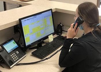 SCSP Staff Member on Phone with Patient